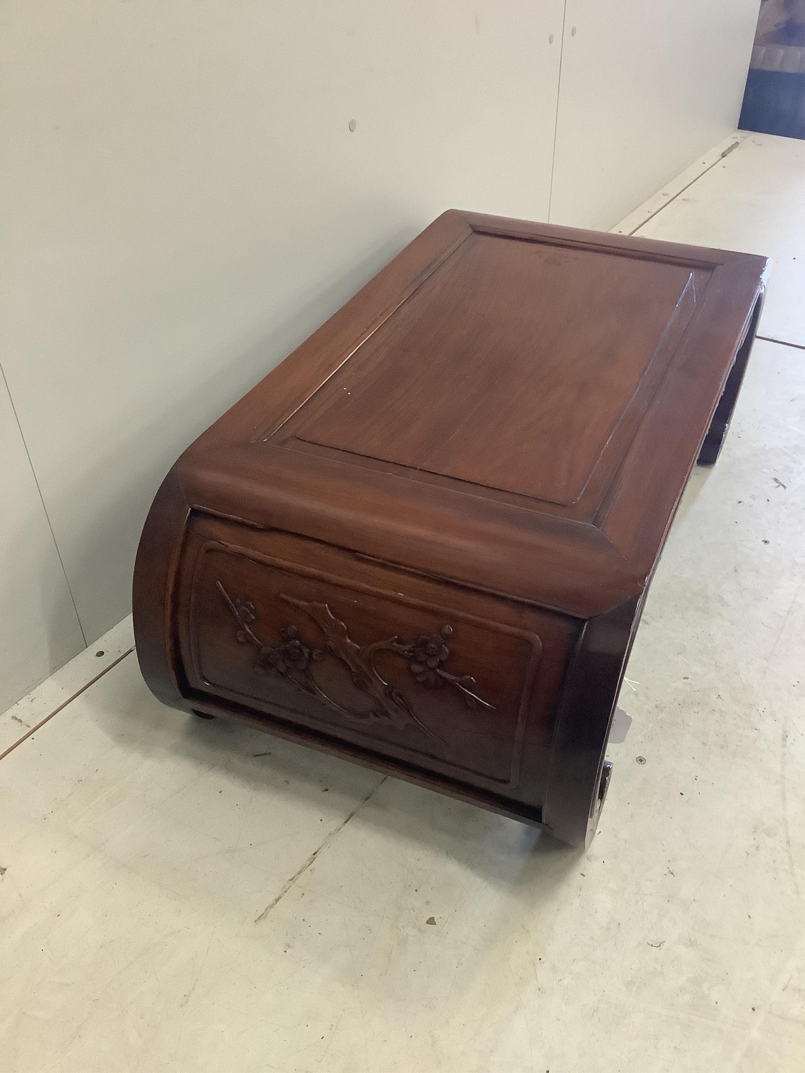 An early 20th century Chinese hardwood opium table, width 88cm, depth 46cm, height 33cm. Condition good.